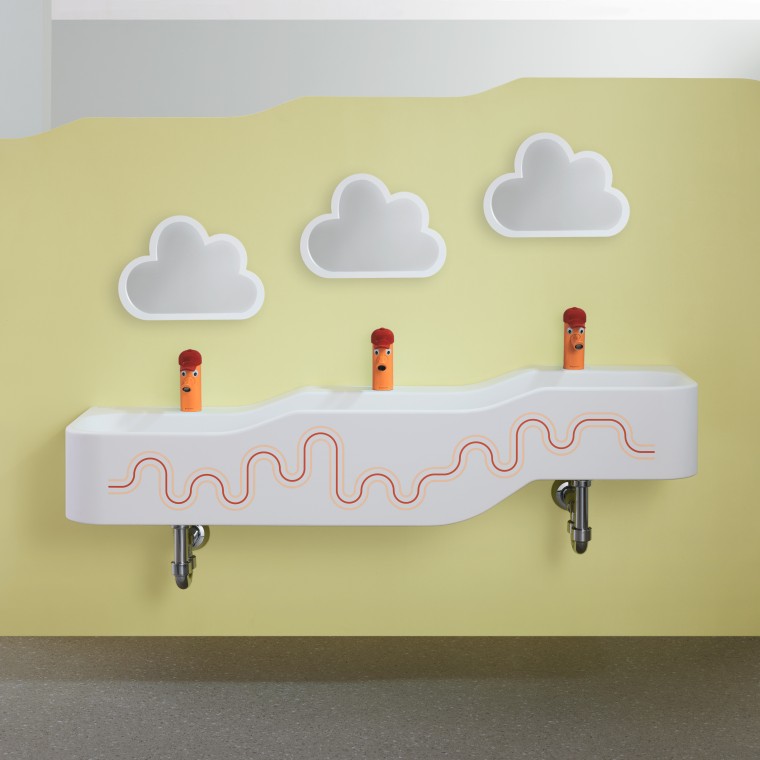 Priestor na hranie a umývanie Geberit Bambini v karmínovej červenej a oranžovej farbe