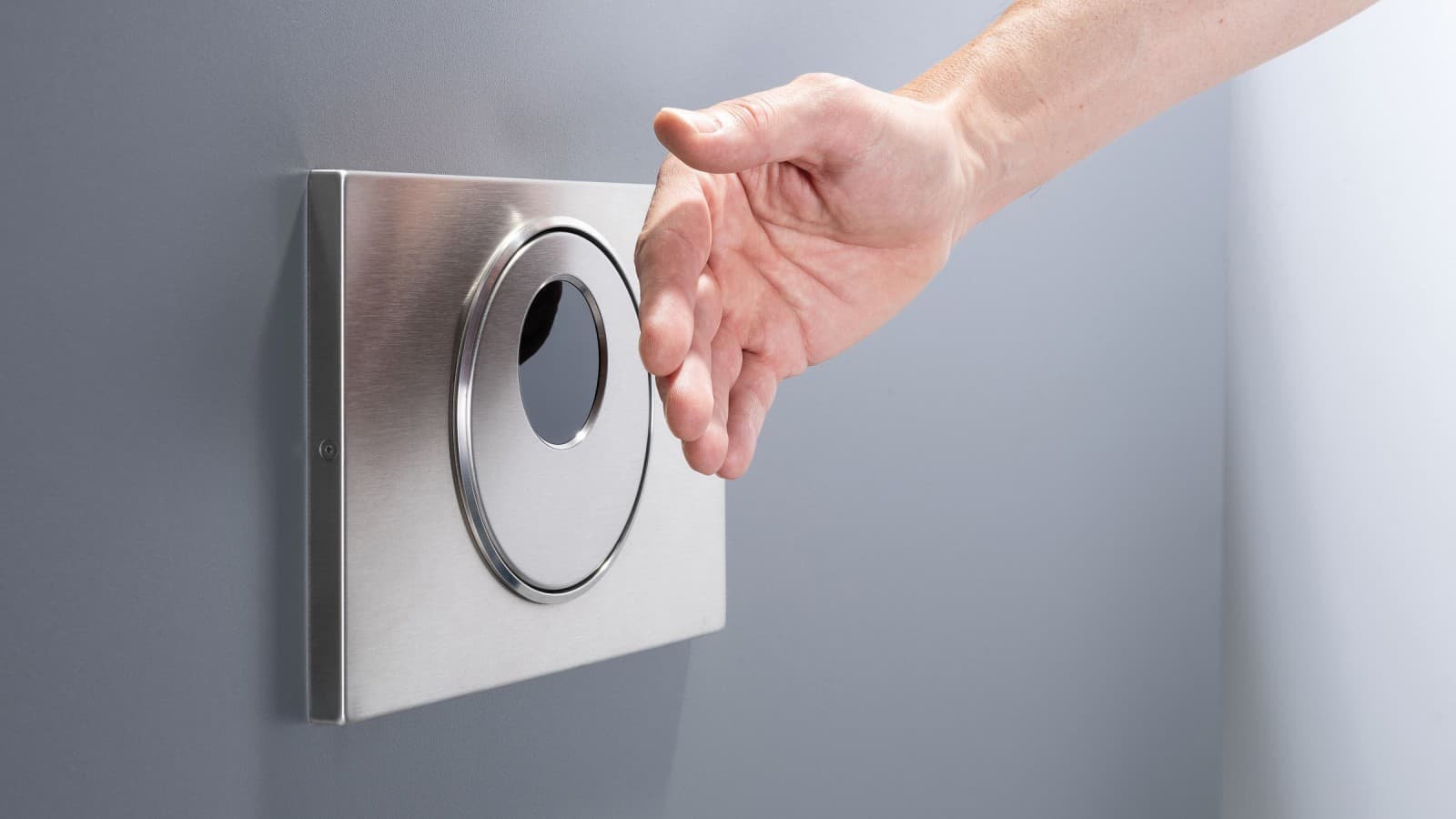 Bezdotykové ovládanie Geberit Sigma10 s rukou Bezdotykové ovládanie Geberit Sigma10 s rukou